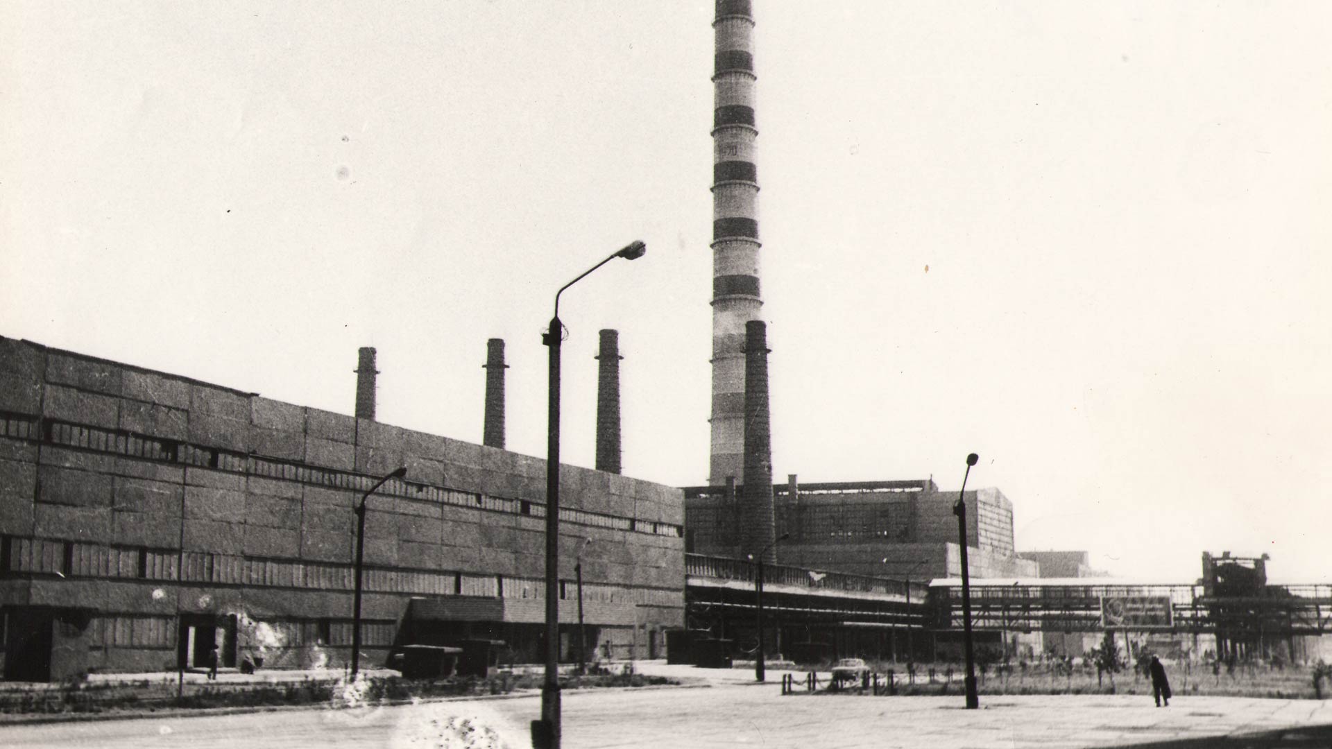 Black and white distant photograph of smelting complex. 