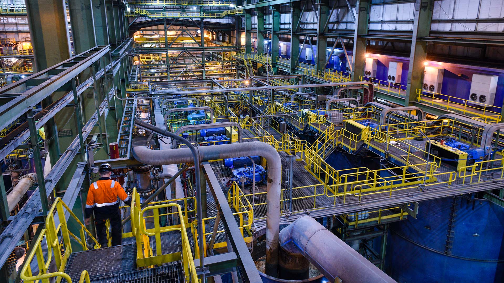 View of indoor multi-level machinery that assists in operations. 